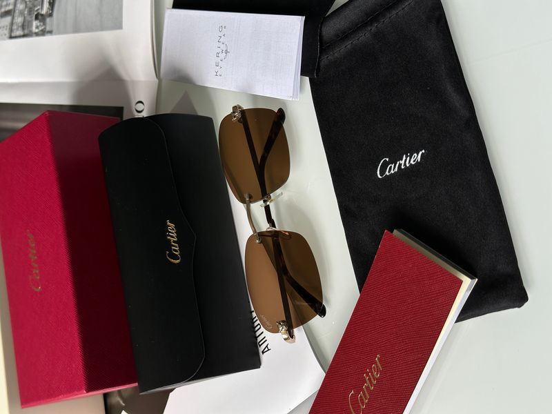 Солнцезащитные очки Cartier CT0148O 001 Brown/Silver Premium фото